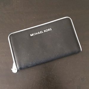 Michael Kors Black wallet.